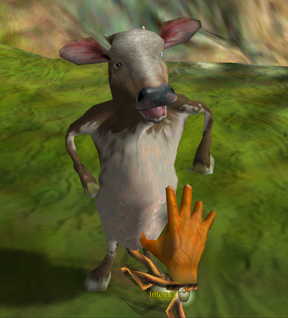 A cow creature stands on a grass field and looks at the god's hand in front of it.